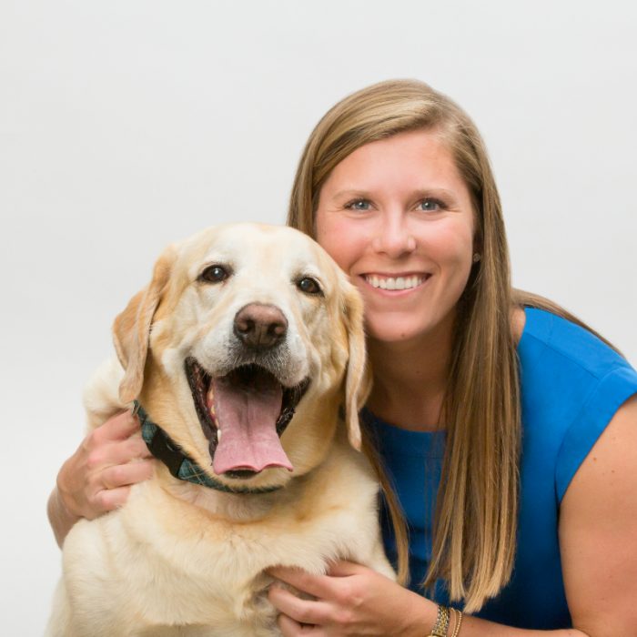 Woman with yellow lab